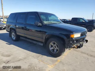 2000 Chevrolet Tahoe Limited with VIN 1GNEC13R4YR141259, listed as a Copart auction lot 85578904 with 195,944 mi miles and Salvage Title. Bid and sale history available at carsss.com. Image 4.