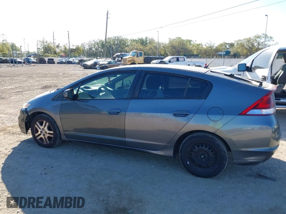 2012 Honda Insight LX with VIN JHMZE2H51CS003694, listed as a IAAI auction lot 41781384 with 154,685 mi miles and . Bid and sale history available at DreamBid. Image 14.