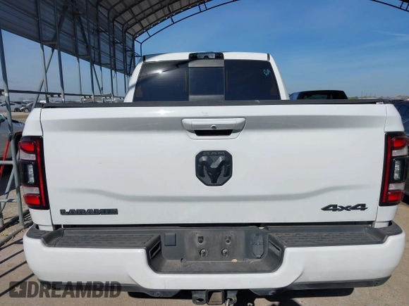 2021 Ram 2500 Laramie with VIN 3C6UR5NLXMG677847, listed as a IAAI auction lot 40992410 with 106,912 mi miles. Bid and sale history available at carsss.com. Image 16.