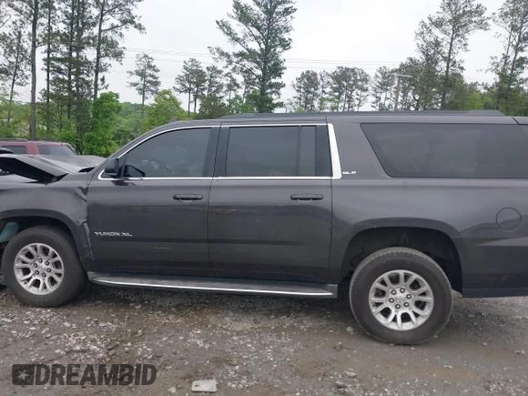 2015 GMC Yukon XL SLE z VIN 1GKS1GKC8FR507436, wystawiony jako IAAI lot #42113696 z przebiegiem Nie podano mil oraz . Historia ofert i sprzedaży dostępna na DreamBid. Obrazek 14.