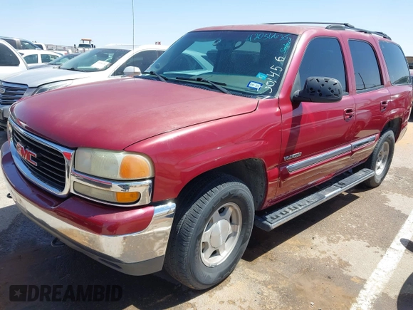 2004 GMC Yukon SLT with VIN 1GKEK13Z44R301456, listed as a IAAI auction lot 42056635 with 196,799 mi miles. Bid and sale history available at carsss.com. Image 2.