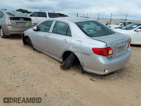 2009 Toyota Corolla with VIN 1NXBU40E49Z086415, listed as a IAAI auction lot 39773955 with 203,803 mi miles and . Bid and sale history available at DreamBid. Image 3.