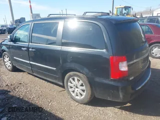 2012 Chrysler Town & Country Touring L with VIN 2C4RC1CG4CR163287, listed as a IAAI auction lot 41924835 with 211,461 mi miles and . Bid and sale history available at carsss.com. Image 3.
