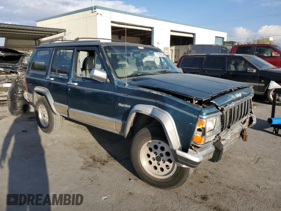 1995 Jeep Cherokee Country with VIN 1J4FJ78S5SL636284, listed as a Copart auction lot 76145234 with 104,048 mi miles and Salvage Title. Bid and sale history available at carsss.com. Image 4.