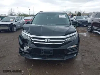 2017 Honda Pilot Touring with VIN 5FNYF6H95HB007854, listed as a IAAI auction lot 41955509 with 103,202 mi miles. Bid and sale history available at carsss.com. Image 12.
