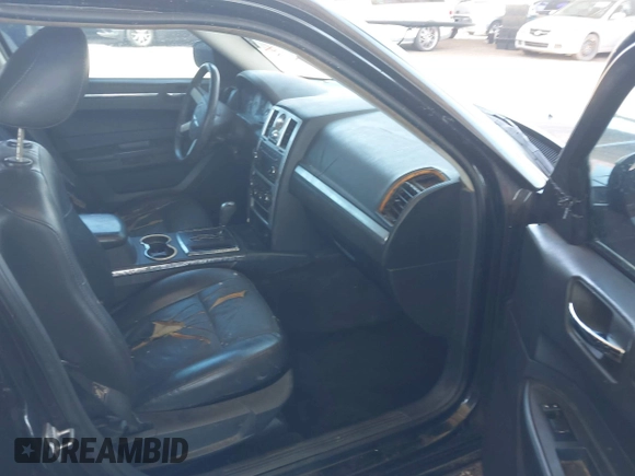 2010 Chrysler 300 Touring with VIN 2C3CA5CV9AH284356, listed as a IAAI auction lot 42124573 with 208,519 mi miles and . Bid and sale history available at DreamBid. Image 5.