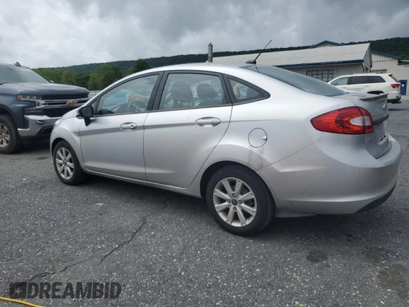 2013 Ford Fiesta SE z VIN 3FADP4BJ9DM108667, wystawiony jako Copart lot #58542295 z przebiegiem 94 812 mil mil oraz Szkoda całkowita • Salvage title. Historia ofert i sprzedaży dostępna na DreamBid. Obrazek 2.