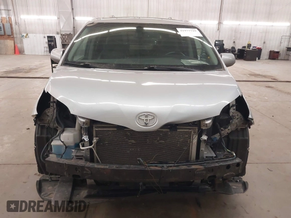 2015 Toyota Sienna SE with VIN 5TDXK3DC9FS527667, listed as a IAAI auction lot 41977729 with 230,933 mi miles and . Bid and sale history available at DreamBid. Image 13.