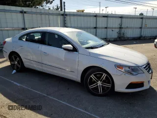 2012 Volkswagen CC Sport PZEV with VIN WVWMP7AN5CE521660, listed as a Copart auction lot 75190794 with 128,416 mi miles and Salvage Title. Bid and sale history available at carsss.com. Image 4.