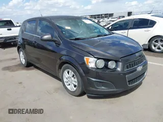 2014 Chevrolet Sonic LT with VIN 1G1JC6SHXE4135948, listed as a IAAI auction lot 41949833 with 127,202 mi miles. Bid and sale history available at carsss.com. Image 1.