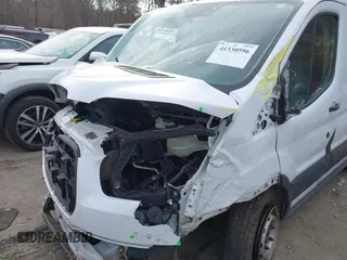 2015 Ford Transit Cargo with VIN 1FTNE1ZM1FKA69893, listed as a IAAI auction lot 41330596 with 234,974 mi miles. Bid and sale history available at carsss.com. Image 6.