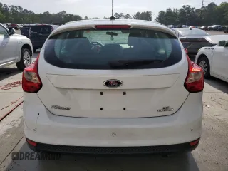 2014 Ford Focus SE z VIN 1FADP3K24EL345833, wystawiony jako Copart lot #57307075 z przebiegiem 158 787 mil mil oraz Szkoda całkowita • Salvage title. Historia ofert i sprzedaży dostępna na DreamBid. Obrazek 6.