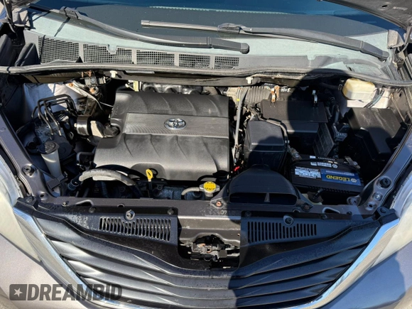 2014 Toyota Sienna LE with VIN 5TDJK3DC4ES074014, listed as a Copart auction lot 48602075 with 284,647 mi miles and Clean Title. Bid and sale history available at DreamBid. Image 7.