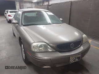 2004 Mercury Sable LS Premium z VIN 1MEFM55S54G601180, wystawiony jako IAAI lot #42162460 z przebiegiem 104 613 mil mil oraz . Historia ofert i sprzedaży dostępna na DreamBid. Obrazek 6.