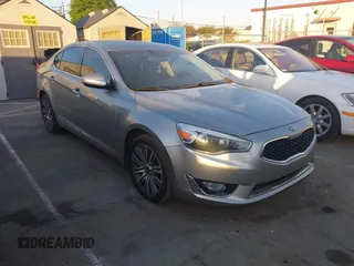 2014 Kia Cadenza Limited with VIN KNALN4D76E5143751, listed as a IAAI auction lot 42067722 with 197,660 mi miles. Bid and sale history available at carsss.com. Image 1.