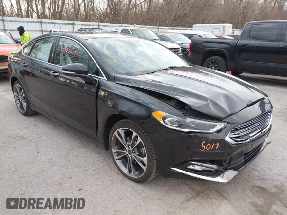 2017 Ford Fusion Titanium z VIN 3FA6P0K98HR200272, wystawiony jako IAAI lot #41905017 z przebiegiem 104 132 mil mil oraz . Historia ofert i sprzedaży dostępna na DreamBid. Obrazek 1.
