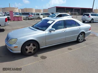 2001 Mercedes-Benz S-Class with VIN WDBNG75JX1A192890, listed as a IAAI auction lot 42088877 with 225,966 mi miles. Bid and sale history available at carsss.com. Image 2.