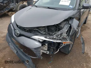 2020 Toyota C-HR LE z VIN JTNKHMBX0L1073916, wystawiony jako IAAI lot #41720784 z przebiegiem 96 730 mil mil oraz . Historia ofert i sprzedaży dostępna na DreamBid. Obrazek 6.