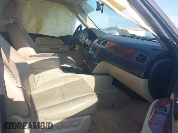 2007 Chevrolet Suburban LS with VIN 1GNFC16007J203853, listed as a IAAI auction lot 39454050 with 246,521 mi miles and . Bid and sale history available at DreamBid. Image 5.