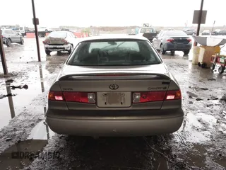 2001 Toyota Camry CE z VIN JT2BG22K410544168, wystawiony jako IAAI lot #42201412 z przebiegiem 158 500 mil mil oraz . Historia ofert i sprzedaży dostępna na DreamBid. Obrazek 16.
