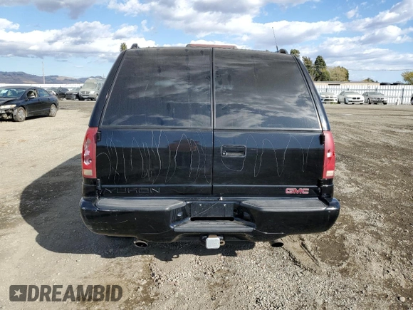 2000 GMC Denali z VIN 1GKEK13R8YR109690, wystawiony jako Copart lot #76165584 z przebiegiem 153 366 mil mil oraz Szkoda całkowita • Salvage title. Historia ofert i sprzedaży dostępna na DreamBid. Obrazek 6.