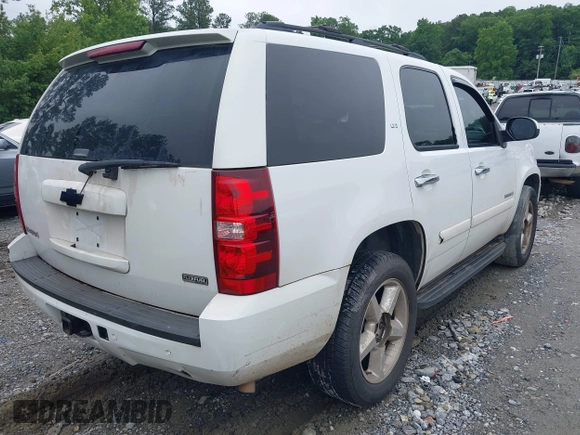 2007 Chevrolet Tahoe LT with VIN 1GNFC13007R415013, listed as a IAAI auction lot 42370633 with 302,992 mi miles and . Bid and sale history available at DreamBid. Image 4.