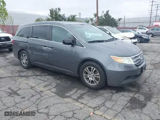 2011 Honda Odyssey EX-L with VIN 5FNRL5H63BB059407, listed as a IAAI auction lot 41922421 with 99,270 mi miles. Bid and sale history available at carsss.com. Image 1.
