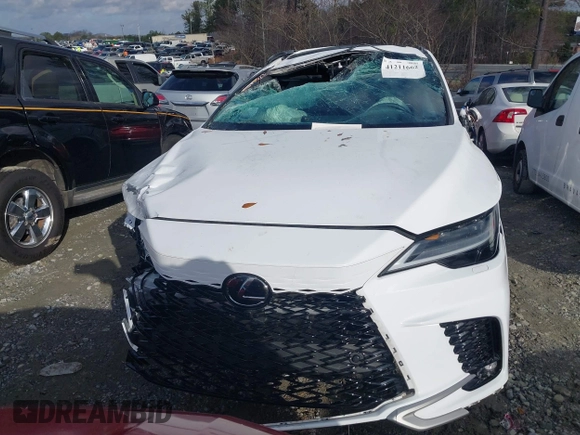 2024 Lexus RX 350 with VIN 2T2BAMCA0RC059176, listed as a IAAI auction lot 41211662 with 13,788 mi miles and . Bid and sale history available at DreamBid. Image 12.