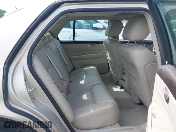 2009 Cadillac DTS 1SA z VIN 1G6KD57Y19U127449, wystawiony jako IAAI lot #42116152 z przebiegiem 107 901 mil mil oraz . Historia ofert i sprzedaży dostępna na DreamBid. Obrazek 8.