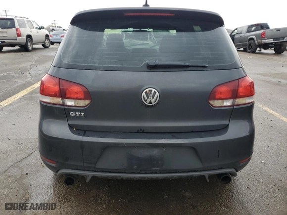2010 Volkswagen GTI with VIN WVWHD7AJ5AW247326, listed as a Copart auction lot 87017824 with 114,665 mi miles and Salvage Title. Bid and sale history available at carsss.com. Image 6.