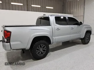 2022 Toyota Tacoma SR5 z VIN 3TMAZ5CN8NM183375, wystawiony jako Copart lot #57228025 z przebiegiem 81 738 mil mil oraz Czysty tytuł • Clean title. Historia ofert i sprzedaży dostępna na DreamBid. Obrazek 3.