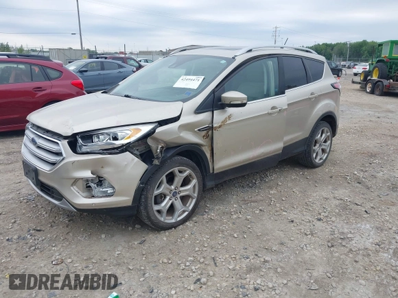 2018 Ford Escape Titanium with VIN 1FMCU9J94JUA44964, listed as a IAAI auction lot 42494471 with 100,955 mi miles and . Bid and sale history available at DreamBid. Image 17.