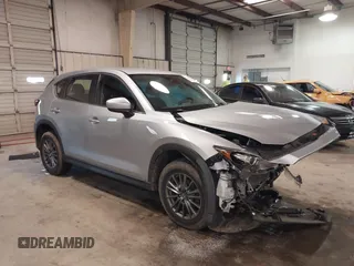 2017 Mazda CX-5 Sport with VIN JM3KFBBL1H0116157, listed as a IAAI auction lot 41584679 with 92,325 mi miles. Bid and sale history available at carsss.com. Image 1.