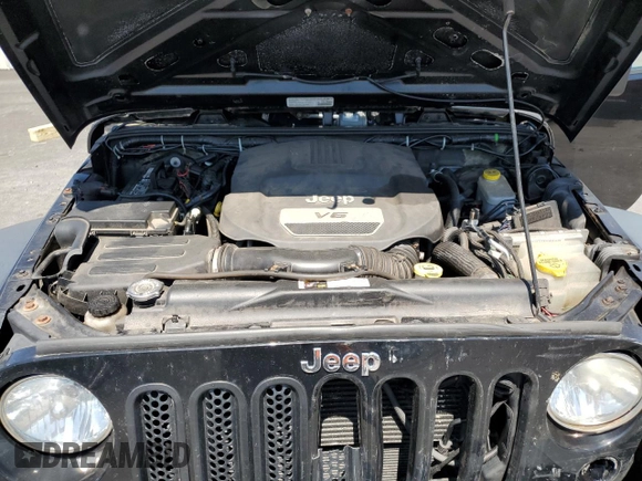 2014 Jeep Wrangler Sport with VIN 1C4AJWAG2EL113843, listed as a Copart auction lot 62771115 with 70,089 mi miles and Salvage title. Bid and sale history available at DreamBid. Image 12.