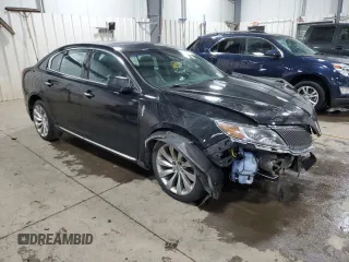 2013 Lincoln MKS with VIN 1LNHL9EK8DG611332, listed as a Copart auction lot 58043345 with 118,910 mi miles and Non repairable. Bid and sale history available at DreamBid. Image 4.