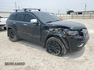 2017 Jeep Grand Cherokee Limited with VIN 1C4RJFBT4HC678985, listed as a Copart auction lot 55685014 with 122,188 mi miles and Salvage title. Bid and sale history available at DreamBid. Image 4.