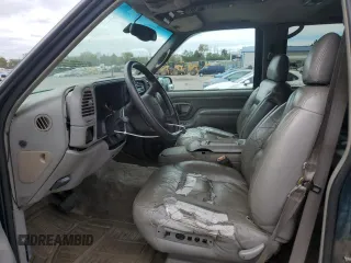 1999 Chevrolet Suburban with VIN 1GNFK16R9XJ516000, listed as a Copart auction lot 73854994 with 263,079 mi miles and Salvage Title. Bid and sale history available at carsss.com. Image 7.
