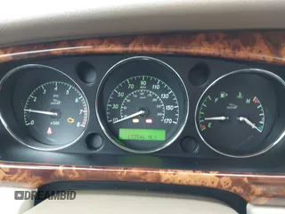 2004 Jaguar XJ with VIN SAJWA71C94SG29019, listed as a IAAI auction lot 41664978 with 133,546 mi miles. Bid and sale history available at carsss.com. Image 7.