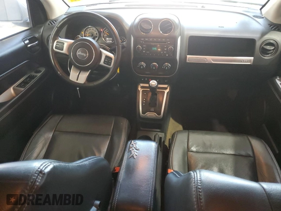 2017 Jeep Compass Latitude with VIN 1C4NJDEB4HD128749, listed as a Copart auction lot 53892245 with 123,549 mi miles and Salvage title. Bid and sale history available at DreamBid. Image 8.
