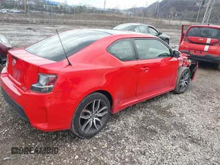 2014 Scion tC z VIN JTKJF5C76E3078810, wystawiony jako IAAI lot #41638613 z przebiegiem 76 648 mil mil oraz . Historia ofert i sprzedaży dostępna na DreamBid. Obrazek 4.