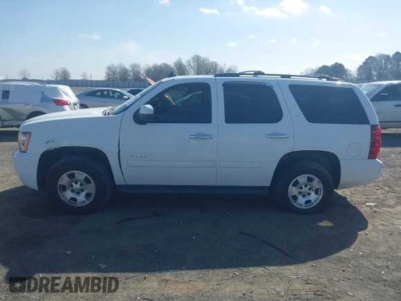 2014 Chevrolet Tahoe LT with VIN 1GNSCBE06ER233105, listed as a IAAI auction lot 41753190 with 161,056 mi miles and . Bid and sale history available at DreamBid. Image 14.