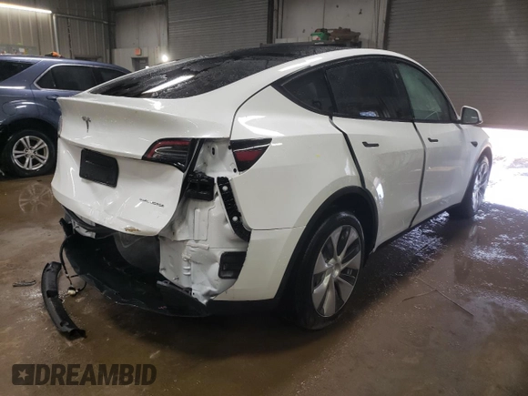 2023 Tesla Model Y Long Range with VIN 7SAYGDEE6PF806434, listed as a Copart auction lot 51455035 with Not Provided miles and Salvage Title. Bid and sale history available at DreamBid. Image 3.