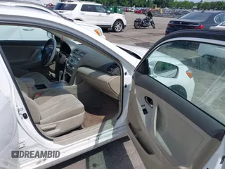 2009 Toyota Camry z VIN 4T1BB46K59U099788, wystawiony jako IAAI lot #42400201 z przebiegiem 306 266 mil mil oraz . Historia ofert i sprzedaży dostępna na DreamBid. Obrazek 5.