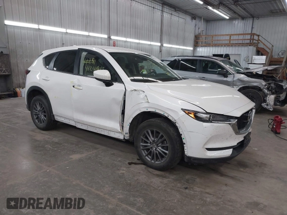 2017 Mazda CX-5 Touring with VIN JM3KFBCL9H0107589, listed as a IAAI auction lot 41241481 with 77,032 mi miles. Bid and sale history available at carsss.com. Image 1.