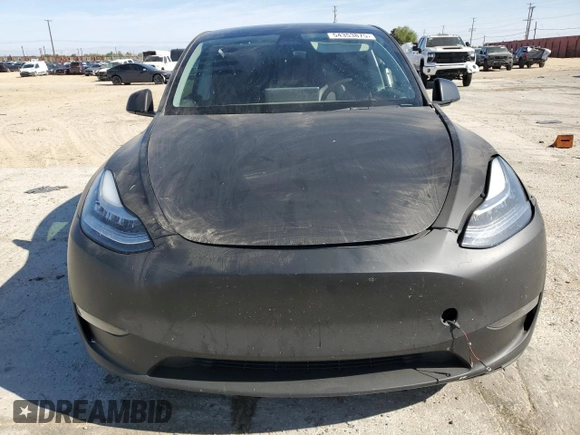 2021 Tesla Model Y Long Range z VIN 5YJYGDEE5MF275302, wystawiony jako Copart lot #54353875 z przebiegiem 63 196 mil mil oraz Szkoda całkowita • Salvage title. Historia ofert i sprzedaży dostępna na DreamBid. Obrazek 5.