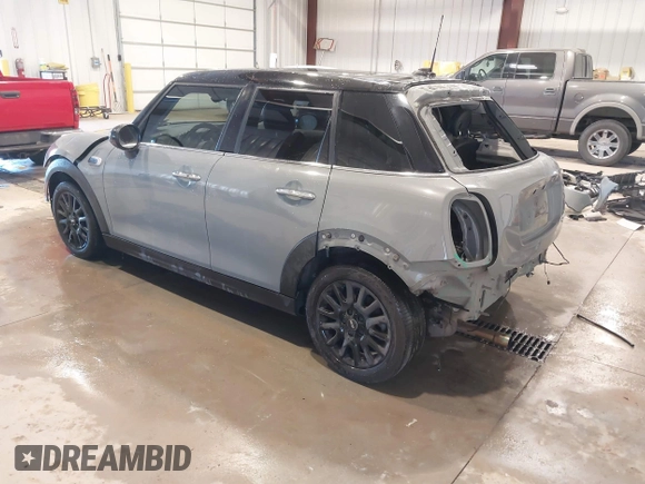 2015 MINI Hardtop 4 Door with VIN WMWXS5C58FT830081, listed as a IAAI auction lot 41345037 with 93,545 mi miles and . Bid and sale history available at DreamBid. Image 3.