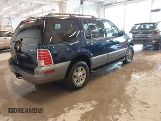 2003 Mercury Mountaineer Convenience z VIN 4M2ZU86W03UJ16828, wystawiony jako IAAI lot #41580919 z przebiegiem 148 968 mil mil oraz . Historia ofert i sprzedaży dostępna na DreamBid. Obrazek 4.