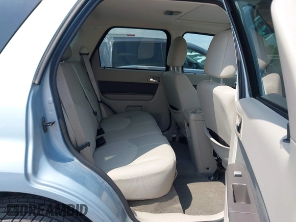2009 Mercury Mariner with VIN 4M2CU81G09KJ06987, listed as a IAAI auction lot 42120169 with 142,363 mi miles and . Bid and sale history available at DreamBid. Image 8.