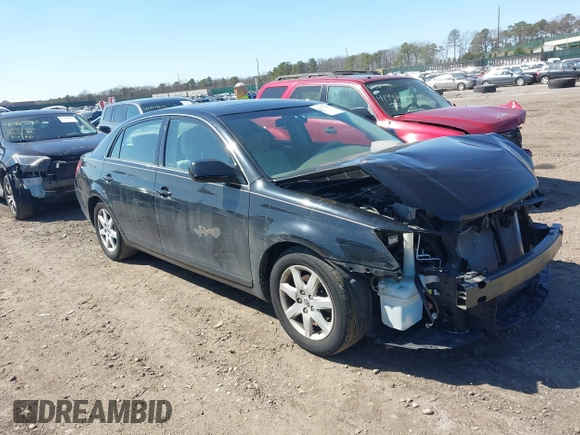 2005 Toyota Avalon XL with VIN 4T1BK36B95U048332, listed as a IAAI auction lot 41977547 with 61,293 mi miles and . Bid and sale history available at carsss.com. Image 1.
