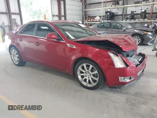 2009 Cadillac CTS AWD with VIN 1G6DT57V590173861, listed as a IAAI auction lot 42587102 with 154,281 mi miles and . Bid and sale history available at DreamBid. Image 1.